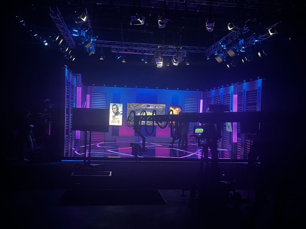 Television studio with a lighting rig set up for a sports broadcast