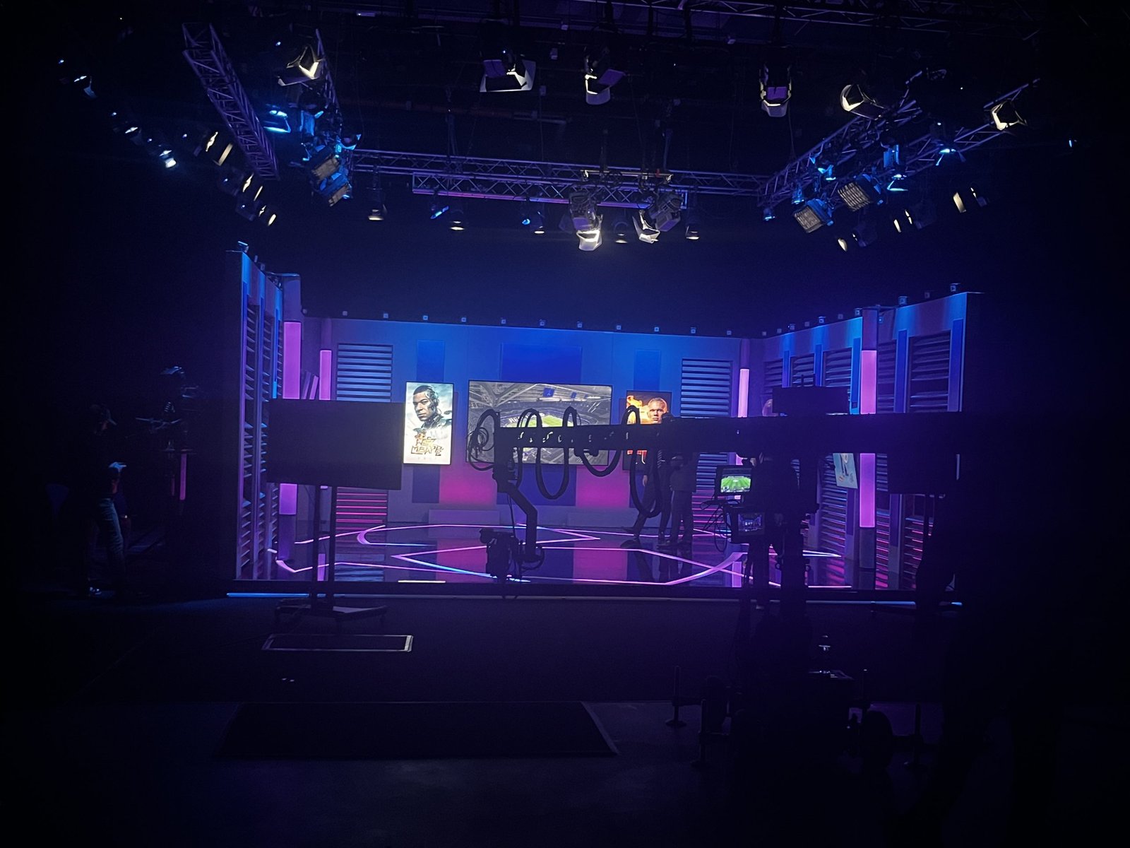 Television studio with a lighting rig set up for a sports broadcast